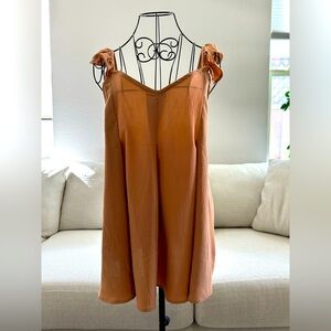 Nude sleeveless blouse